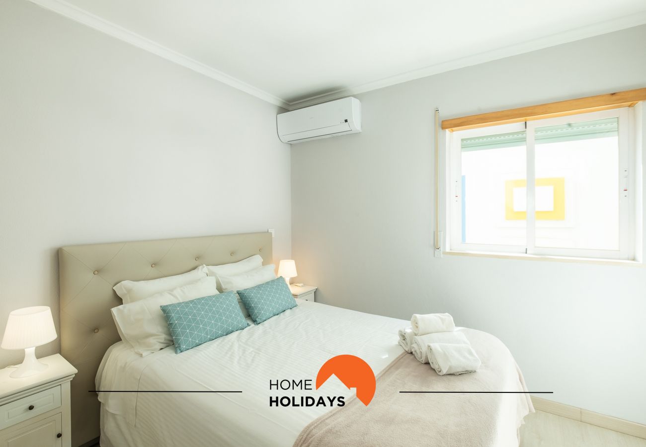 Quarto cama de casal com ar condicionado 