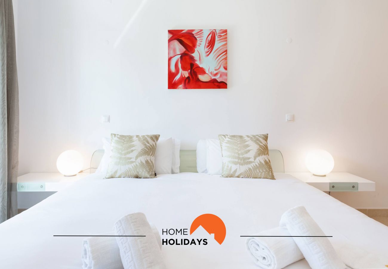 Quarto cama de casal decoração moderna e cuidadosa